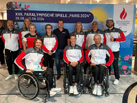 Gruppenfoto mit Sportler:innen